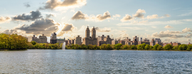 Skyline panorama with Eldorado building and reservoir with fountain in Central Park in midtown Manhattan in New York City
