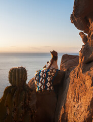 Girl watching the sunset, Baja California, Mexico