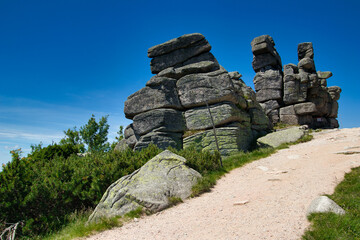 Rock formation Three pigs - stones in Poland. Krkonose.