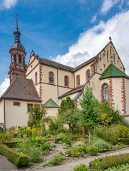 Herb garden view of St. Mary‘s Church in the historic centre of Gengenbach , Kinzig Valley, Ortenau. Baden Wuerttemberg, Germany, Europe