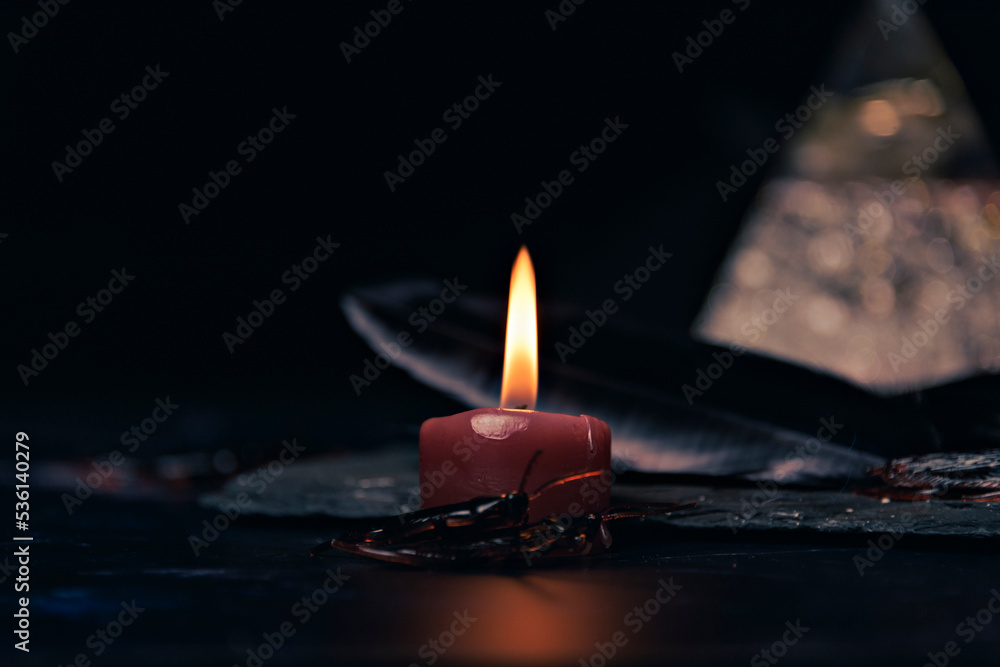 Wall mural magic potions in witch's house with burning candles at night.