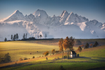 Colorful autumn, a view of the Tatra Mountains panorama and snow-capped mountain peaks. Kacwin,...