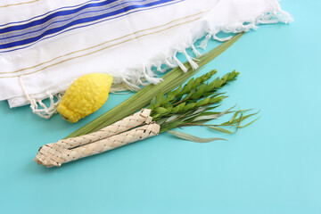 Jewish festival of Sukkot. Traditional symbols (The four species): Etrog (citron), lulav (palm...