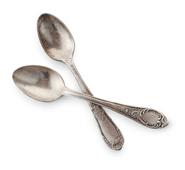 Top view of two old silver teaspoons
