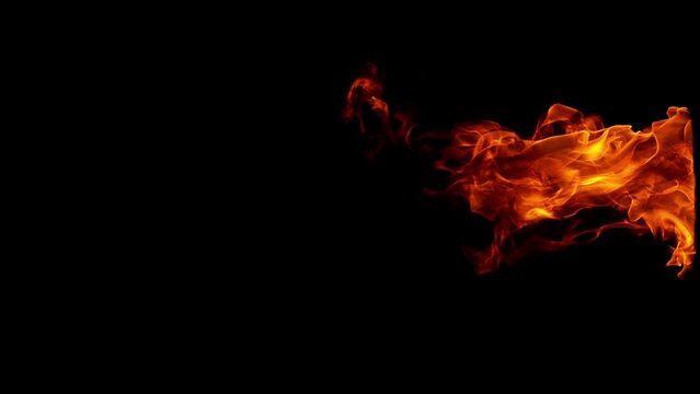 Super slow motion of fire isolated on black background. Filmed on high speed cinema camera