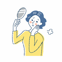 髪の悩み　手鏡で白髪を見てる女性