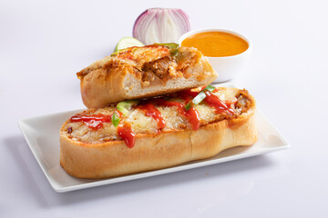 Chicken roll isolated on white with sauce