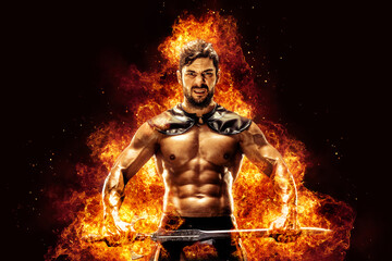 Fototapeta na wymiar Sportive man in leather warrior costume with sword, fire on background