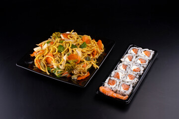 chinese food plate black vegetarian yakisoba black plate with 10 sushi philadelphia in open delivery packaging