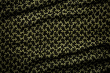 Keffieh scarf. The texture of the cotton traditional symbolic arabian scarf. Khaki back.