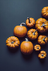 Orange pumpkins lying on blue background, large number of Halloween pumpkins
