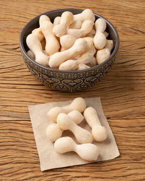 Traditional brazilian polvilho or starch biscuit on a bowl over wooden table