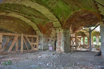 interior interior of an abandoned red brick building, abandoned church