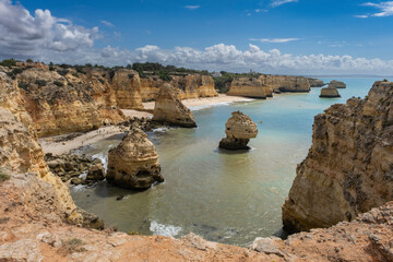 Fototapeta na wymiar The suggestive Marinha beach with its cliffs
