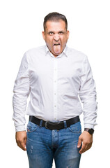 Fototapeta premium Middle age arab elegant man over isolated background sticking tongue out happy with funny expression. Emotion concept.