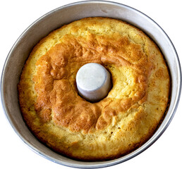 Closeup of baked cake in pan.