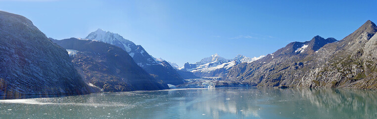 View of Glacier Bay National Park from the stern of a cruise ship - Just 250 ears ago this bay was all ice and extended 100 miles long and thousands of feet deep.
