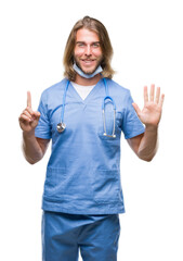 Young handsome doctor man with long hair over isolated background showing and pointing up with fingers number six while smiling confident and happy.