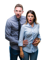 Young workers business couple over isolated background afraid and shocked with surprise expression, fear and excited face.