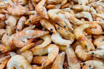Frozen shrimp. Seafood on the counter. Fish market. Close-up sho