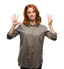 Young beautiful woman over isolated background showing and pointing up with fingers number eight while smiling confident and happy.