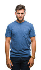 Young handsome man over isolated background skeptic and nervous, frowning upset because of problem. Negative person.