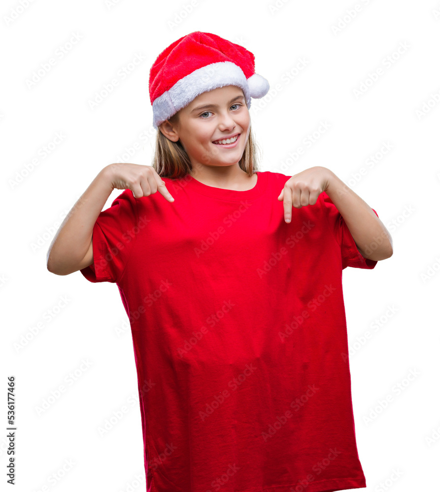 Wall mural Young beautiful girl wearing christmas hat over isolated background looking confident with smile on face, pointing oneself with fingers proud and happy.