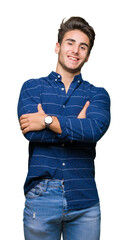 Fototapeta premium Young handsome man wearing navy shirt over isolated background happy face smiling with crossed arms looking at the camera. Positive person.