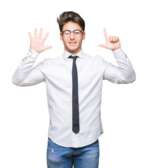 Young business man wearing glasses over isolated background showing and pointing up with fingers number seven while smiling confident and happy.