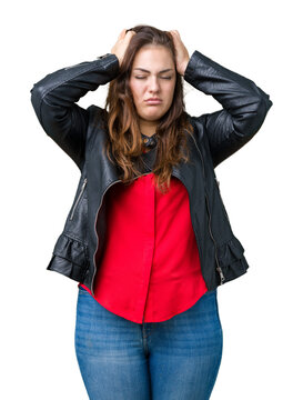 Beautiful plus size young woman wearing a fashion leather jacket over isolated background suffering from headache desperate and stressed because pain and migraine. Hands on head.