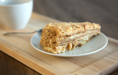 yellow honey cake on white plate