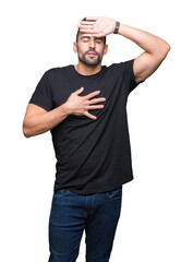 Young handsome man over isolated background Touching forehead for illness and fever, flu and cold,...