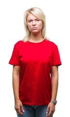 Fototapeta premium Young beautiful blonde woman wearing red t-shirt over isolated background skeptic and nervous, frowning upset because of problem. Negative person.