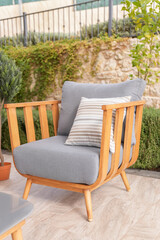 Fototapeta na wymiar Sofa wood and residential fabric with cushion, modern 