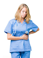 Beautiful young doctor woman wearing medical uniform over isolated background with hand on stomach because nausea, painful disease feeling unwell. Ache concept.