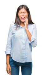 Young asian business woman over isolated background touching mouth with hand with painful expression because of toothache or dental illness on teeth. Dentist concept.