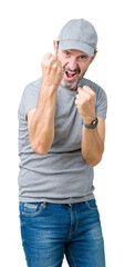 Handsome middle age hoary senior man wearing sport cap over isolated background Ready to fight with fist defense gesture, angry and upset face, afraid of problem