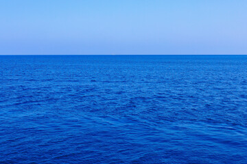Fototapeta premium View of the open sea from the yacht. Background with selective focus