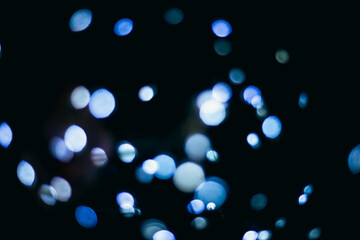 glare on a black background blue color