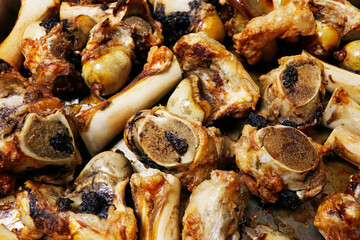 roasted veal marrow bone or beef bone from the oven for stock or sauce preparation