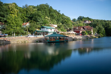 Fototapeta na wymiar Raft cafe on river Gradac, Valjevo