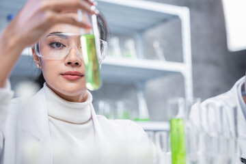 pharmaceutical science laboratory of health care cosmetic research, apothecary scientist working to...
