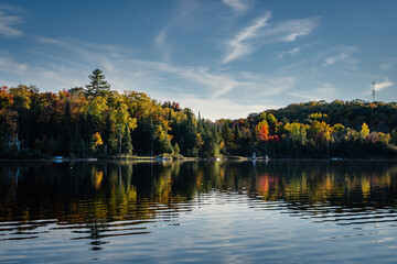 Cottage docks line the shore of this small peaceful lake.