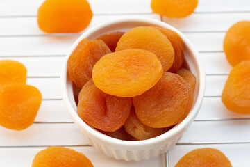 Fototapeta na wymiar Dried apricots on white background.
