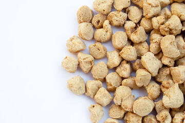 Textured soy protein on white background.