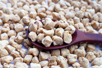 Textured soy protein on white background.
