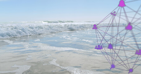 Image of network of connections with icons and stock market over sea