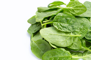 Spinach leaves on white background.