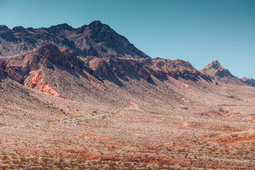 Cars on a road driving through Zion National Park