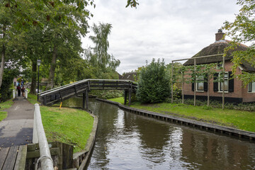 Fototapeta premium Giethoorn Netherlands Venice of the North bridge over the canal in the village